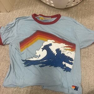 Blue Graphic Tee with Wave Design